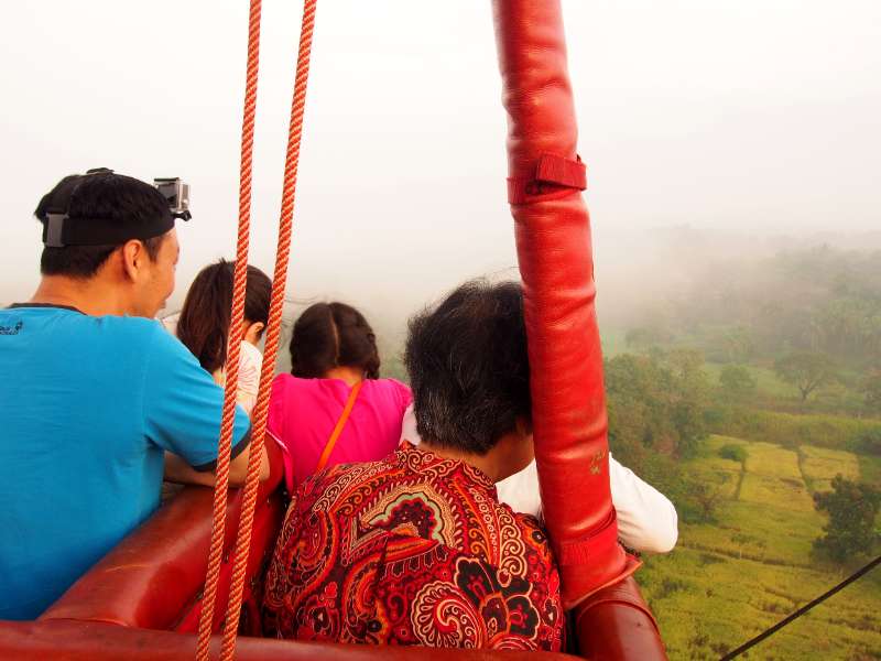 Experiencing the hot air ballooning tour with their family in Sri Lanka