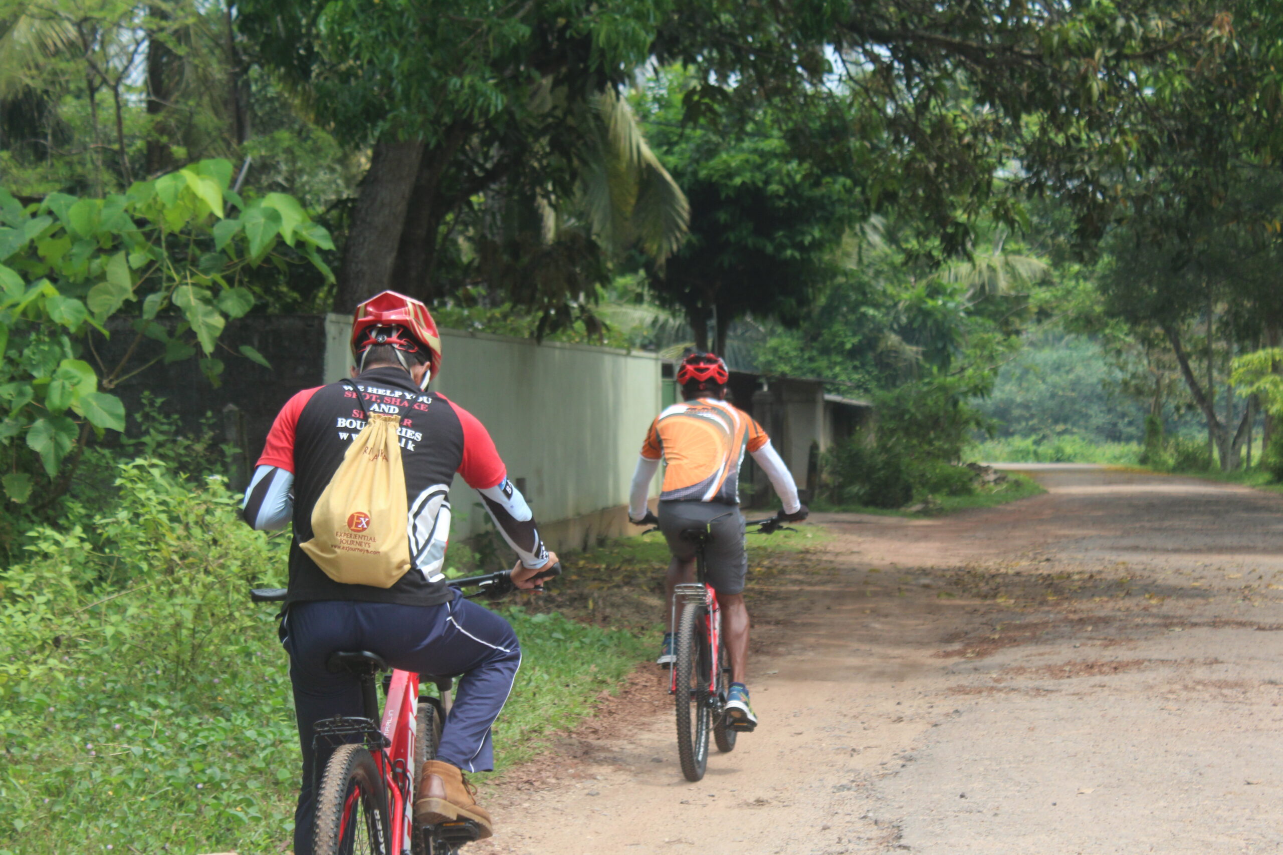 Two cycle riders experiencing cycling adventure